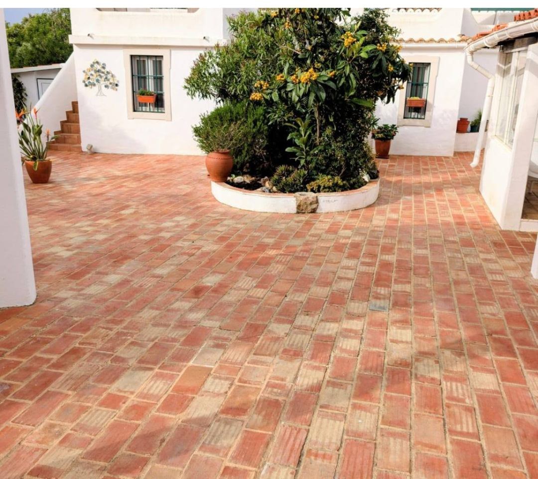 After: Terracotta courtyard pressure washing before and after, Algarve