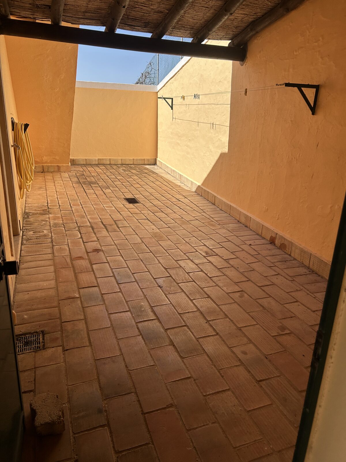 After: Courtyard clearance before and after Algarve