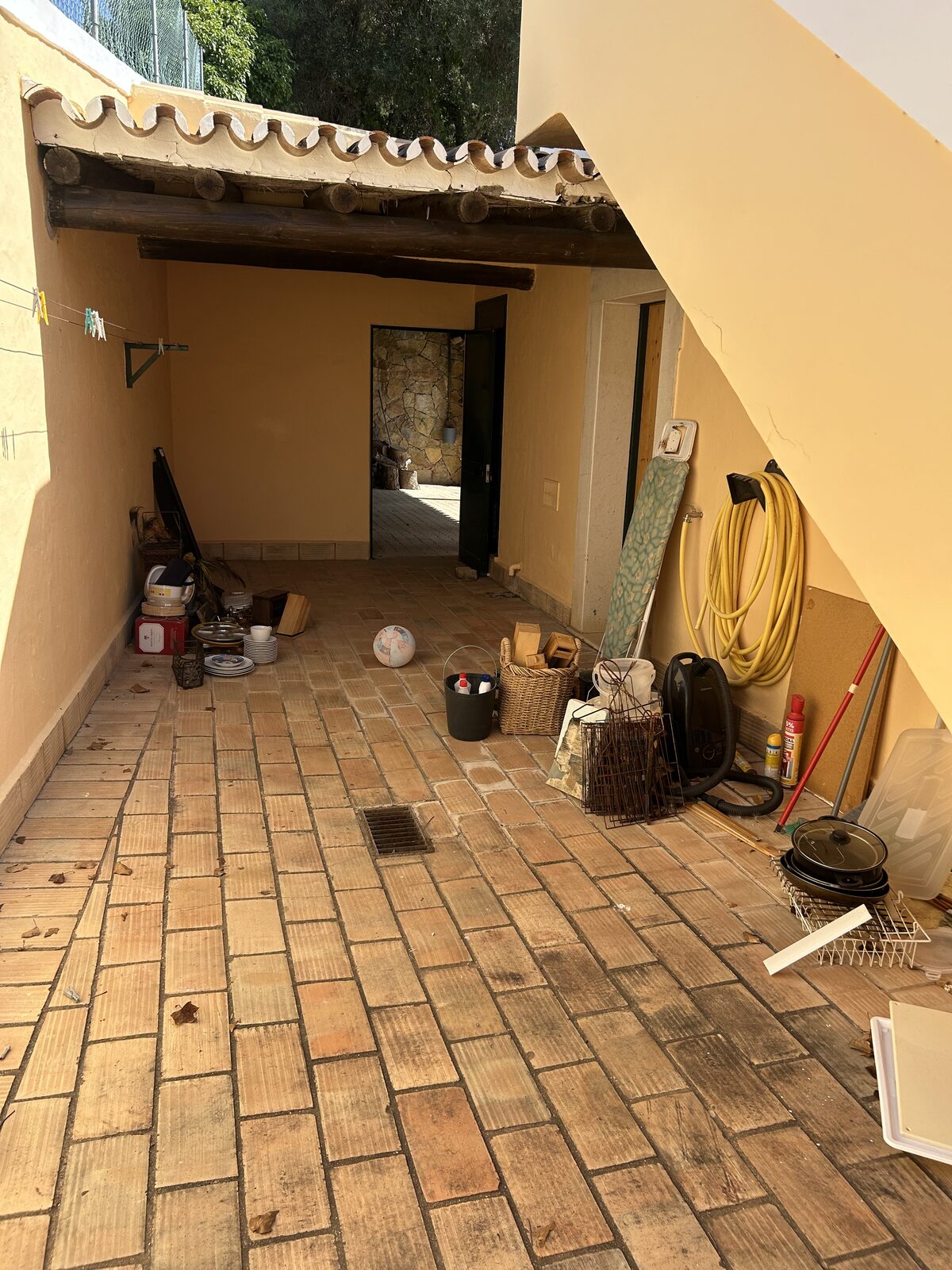 Before: Courtyard clearance before and after Algarve