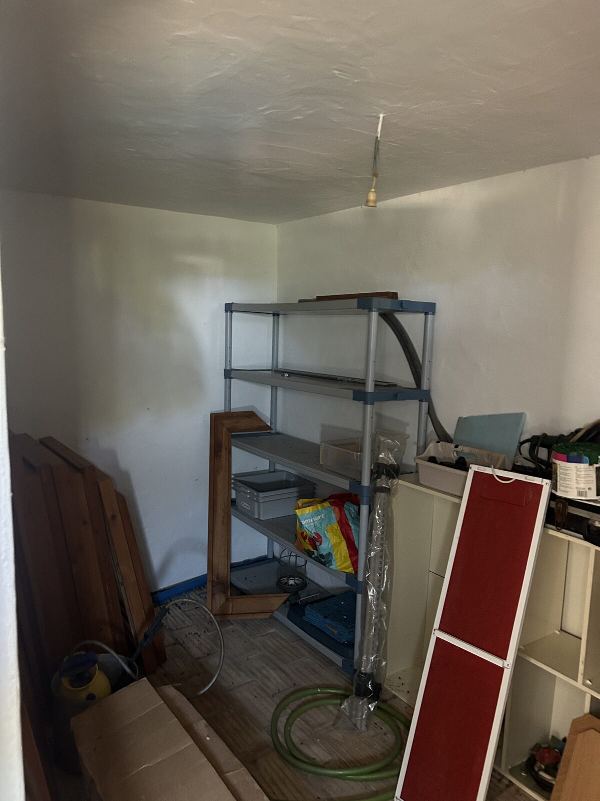 Before: Storage room corner cleared Algarve