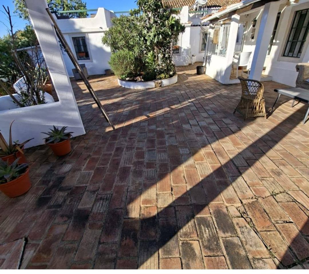 Before: Terracotta courtyard pressure washing before and after, Algarve